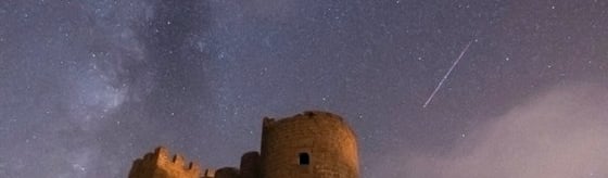 brown concrete building under starry night