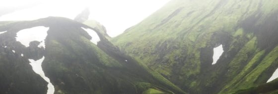 green mountain under white sky during daytime