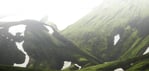 green mountain under white sky during daytime
