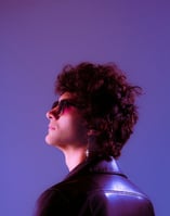 woman in black shirt wearing sunglasses