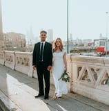 man in black suit standing beside woman in white wedding dress