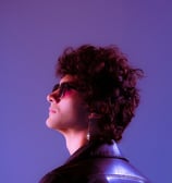 woman in black shirt wearing sunglasses