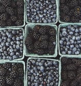 black berries on black surface