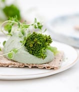 green vegetable on white ceramic plate