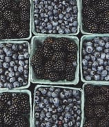 black berries on black surface