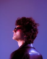 woman in black shirt wearing sunglasses