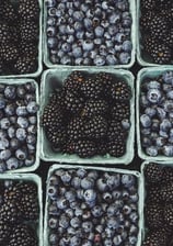 black berries on black surface