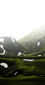 green mountain under white sky during daytime