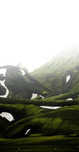 green mountain under white sky during daytime