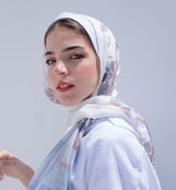 woman in white hijab smiling