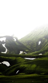 green mountain under white sky during daytime