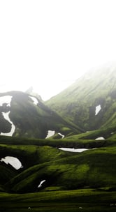 green mountain under white sky during daytime
