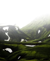 green mountain under white sky during daytime