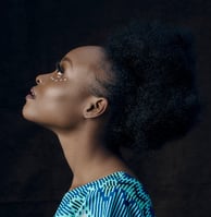woman in blue and white shirt