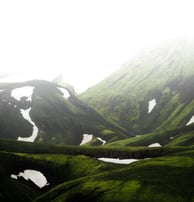 green mountain under white sky during daytime