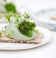 green vegetable on white ceramic plate