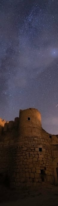 brown concrete building under starry night