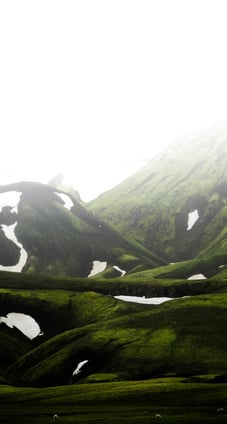 green mountain under white sky during daytime