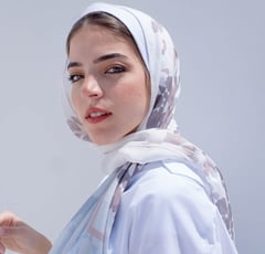 woman in white hijab smiling
