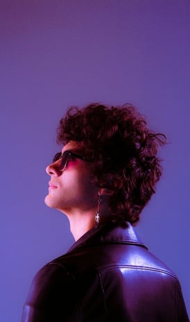 woman in black shirt wearing sunglasses