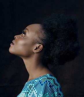 woman in blue and white shirt