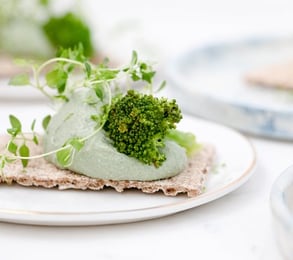 green vegetable on white ceramic plate