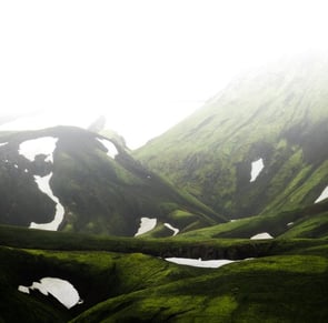 green mountain under white sky during daytime