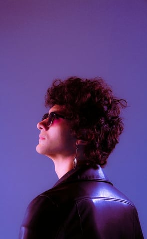 woman in black shirt wearing sunglasses
