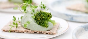 green vegetable on white ceramic plate