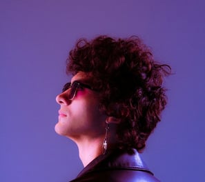 woman in black shirt wearing sunglasses