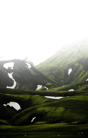 green mountain under white sky during daytime
