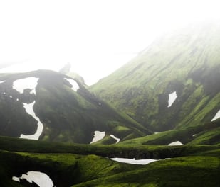 green mountain under white sky during daytime