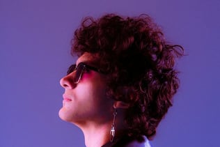 woman in black shirt wearing sunglasses