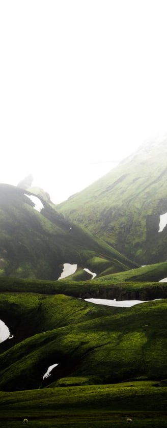 green mountain under white sky during daytime