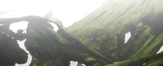green mountain under white sky during daytime