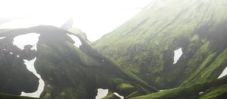 green mountain under white sky during daytime