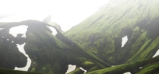 green mountain under white sky during daytime