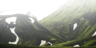 green mountain under white sky during daytime