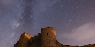 brown concrete building under starry night