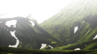 green mountain under white sky during daytime