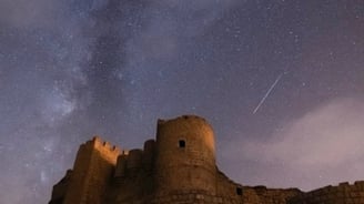 brown concrete building under starry night