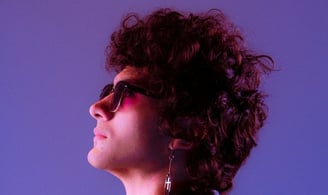 woman in black shirt wearing sunglasses