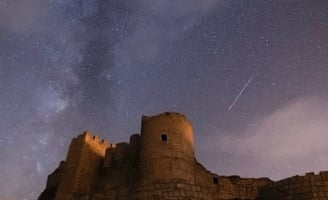 brown concrete building under starry night