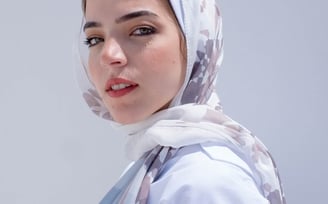 woman in white hijab smiling