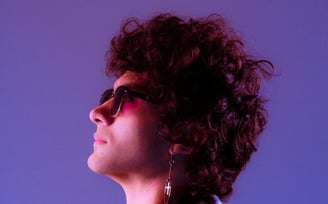 woman in black shirt wearing sunglasses