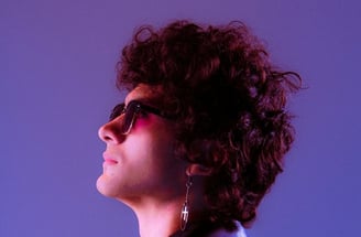 woman in black shirt wearing sunglasses