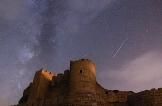 brown concrete building under starry night