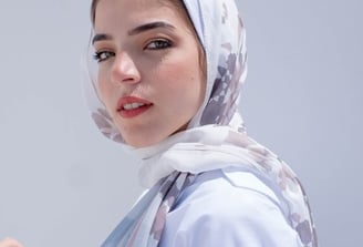 woman in white hijab smiling