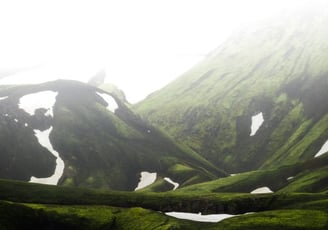 green mountain under white sky during daytime