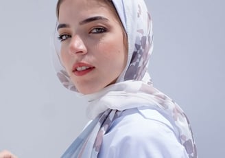 woman in white hijab smiling